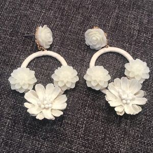 White floral statement earrings